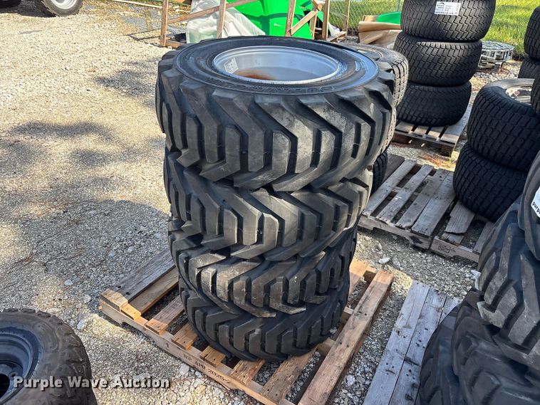 image for item DV7255 (4) 12-16.5 tires and wheels