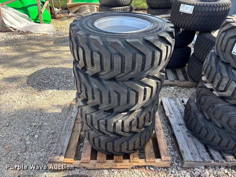 image for item DV7255 (4) 12-16.5 tires and wheels