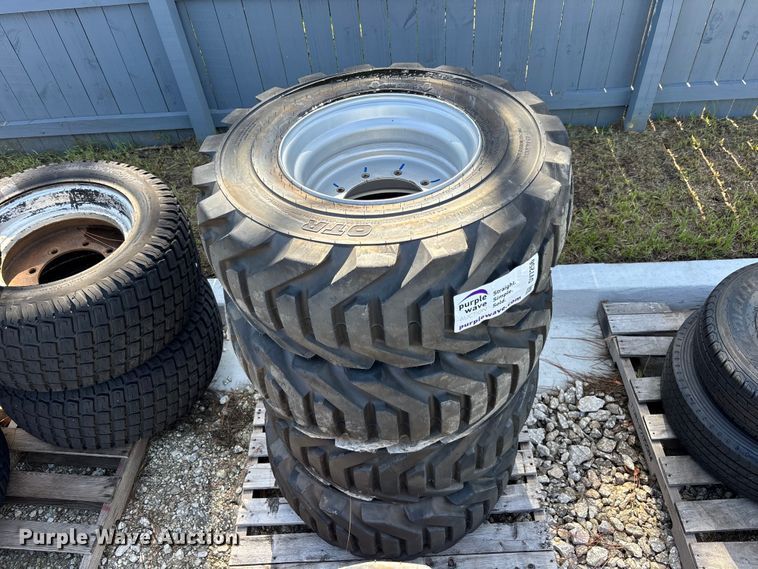 image for item DV7256 (4) 12-16.5 tires and wheels
