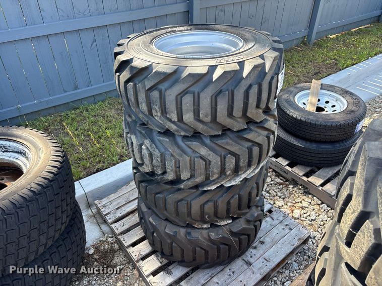 image for item DV7256 (4) 12-16.5 tires and wheels