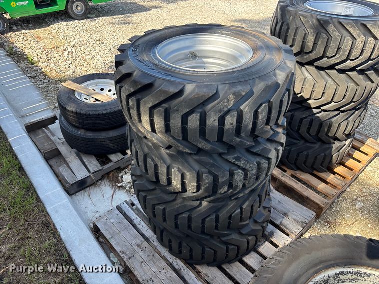 image for item DV7256 (4) 12-16.5 tires and wheels