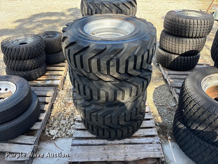 image for item DV7256 (4) 12-16.5 tires and wheels