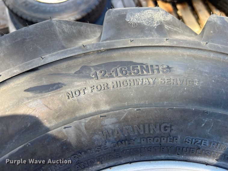 image for item DV7256 (4) 12-16.5 tires and wheels