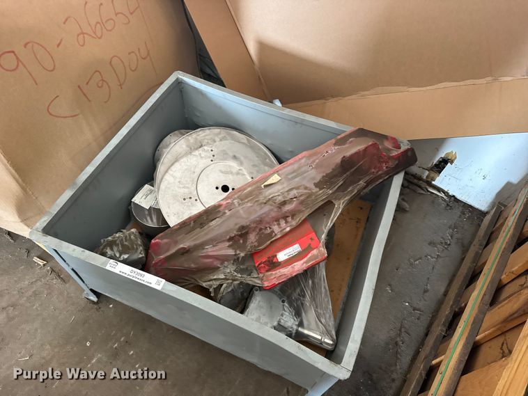 Crate of grain drill parts