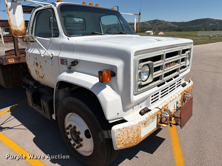 image for item ER1892 1985 GMC C7 flatbed truck