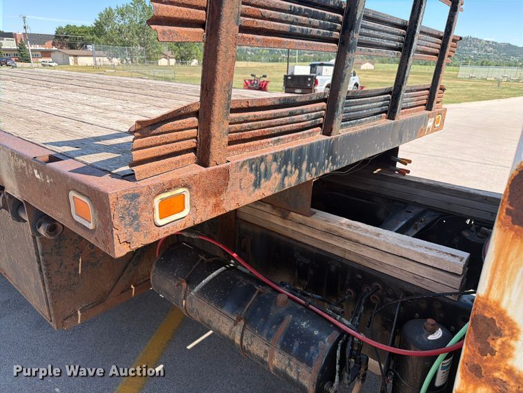 image for item ER1892 1985 GMC C7 flatbed truck