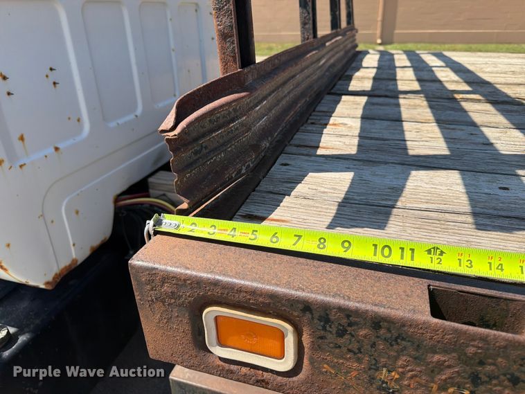image for item ER1892 1985 GMC C7 flatbed truck