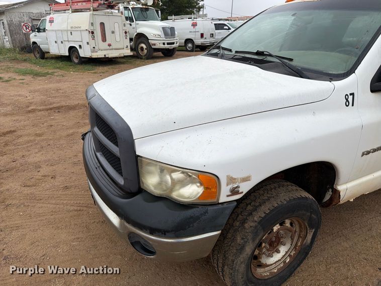 image for item ER1905 2003 Dodge Ram 3500 Ext. Cab utility bed pickup truck