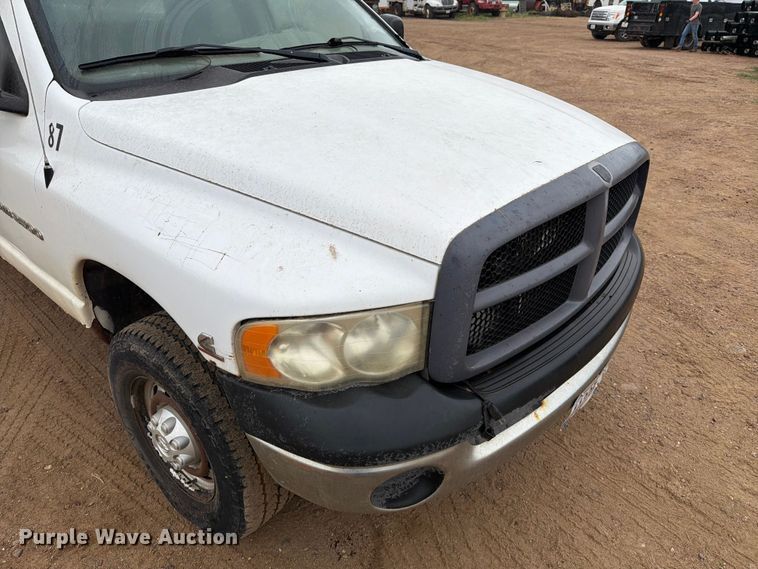 image for item ER1905 2003 Dodge Ram 3500 Ext. Cab utility bed pickup truck