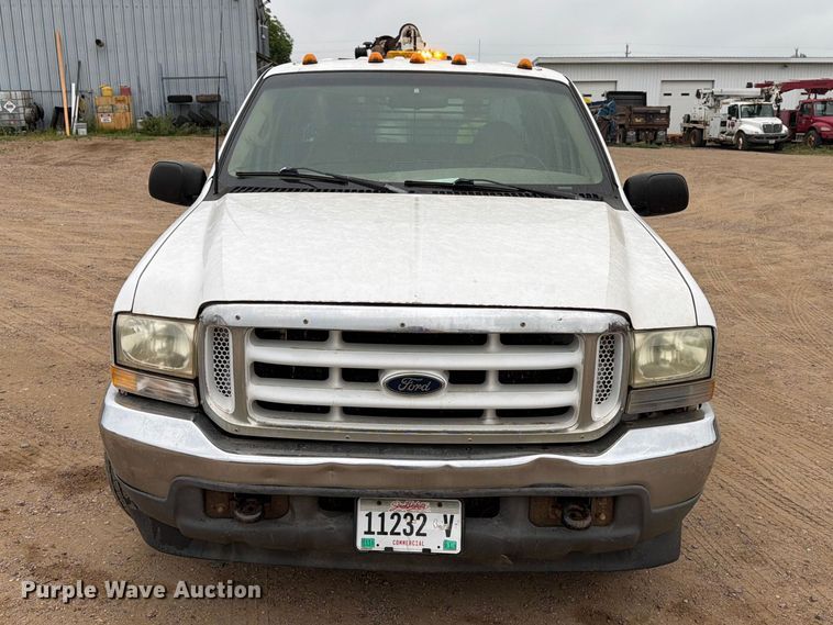 image for item ER1917 2000 Ford F250 Super Duty Crew Cab dump flatbed pickup truck