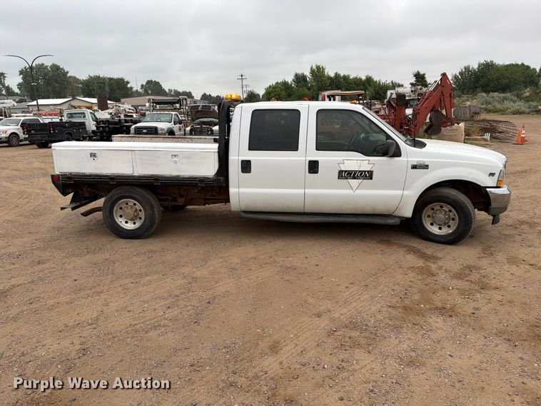image for item ER1917 2000 Ford F250 Super Duty Crew Cab dump flatbed pickup truck
