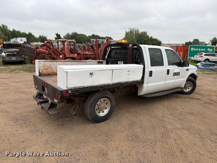 image for item ER1917 2000 Ford F250 Super Duty Crew Cab dump flatbed pickup truck