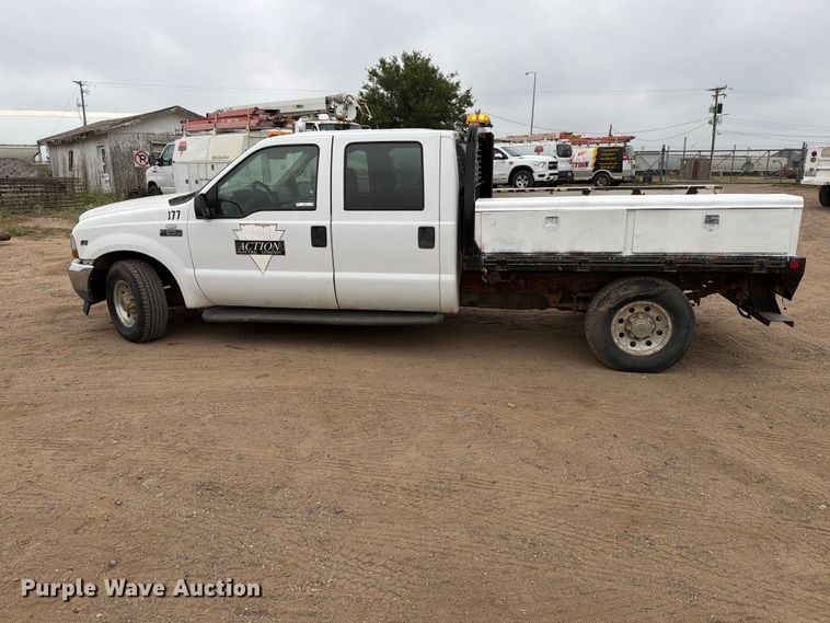 image for item ER1917 2000 Ford F250 Super Duty Crew Cab dump flatbed pickup truck