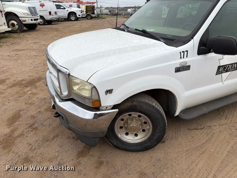 image for item ER1917 2000 Ford F250 Super Duty Crew Cab dump flatbed pickup truck