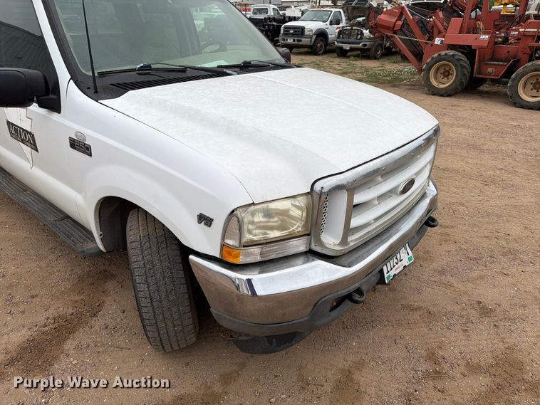 image for item ER1917 2000 Ford F250 Super Duty Crew Cab dump flatbed pickup truck