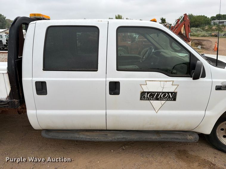 image for item ER1917 2000 Ford F250 Super Duty Crew Cab dump flatbed pickup truck