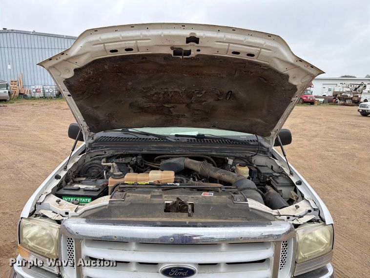 image for item ER1917 2000 Ford F250 Super Duty Crew Cab dump flatbed pickup truck