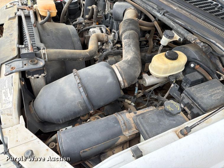 image for item ER1917 2000 Ford F250 Super Duty Crew Cab dump flatbed pickup truck