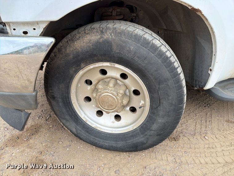 image for item ER1917 2000 Ford F250 Super Duty Crew Cab dump flatbed pickup truck