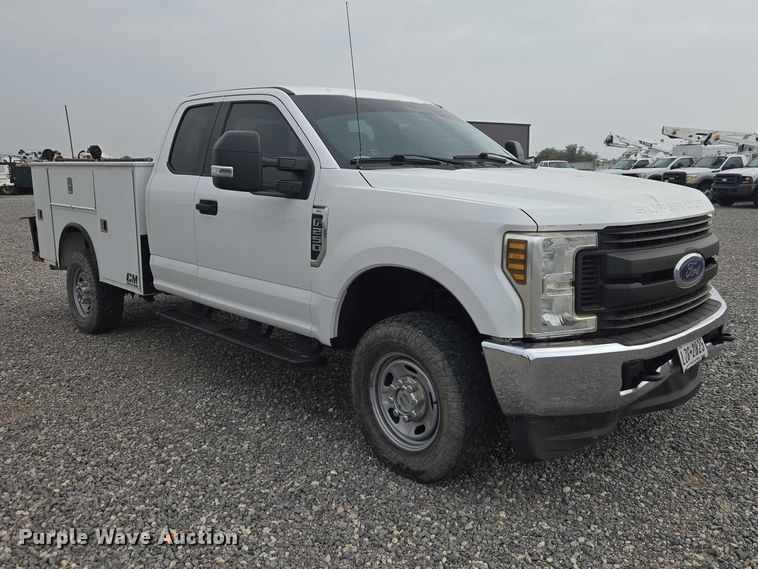 image for item EW0143 2019 Ford F250 Super Duty Ext. Cab utility bed pickup truck