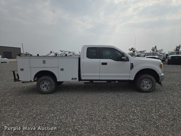 image for item EW0143 2019 Ford F250 Super Duty Ext. Cab utility bed pickup truck