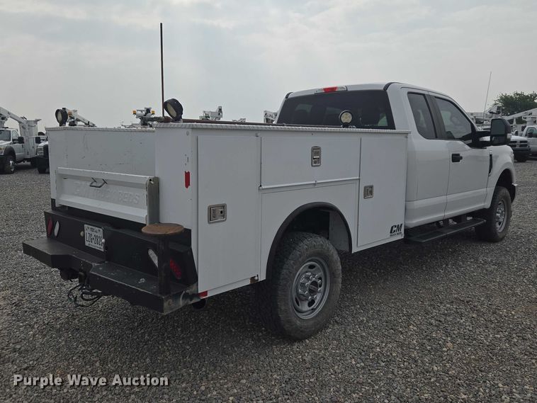 image for item EW0143 2019 Ford F250 Super Duty Ext. Cab utility bed pickup truck