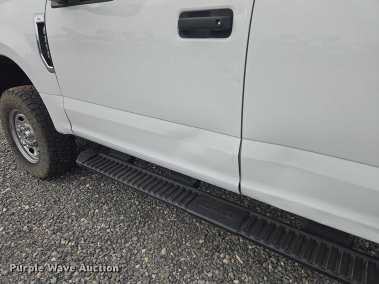 image for item EW0143 2019 Ford F250 Super Duty Ext. Cab utility bed pickup truck