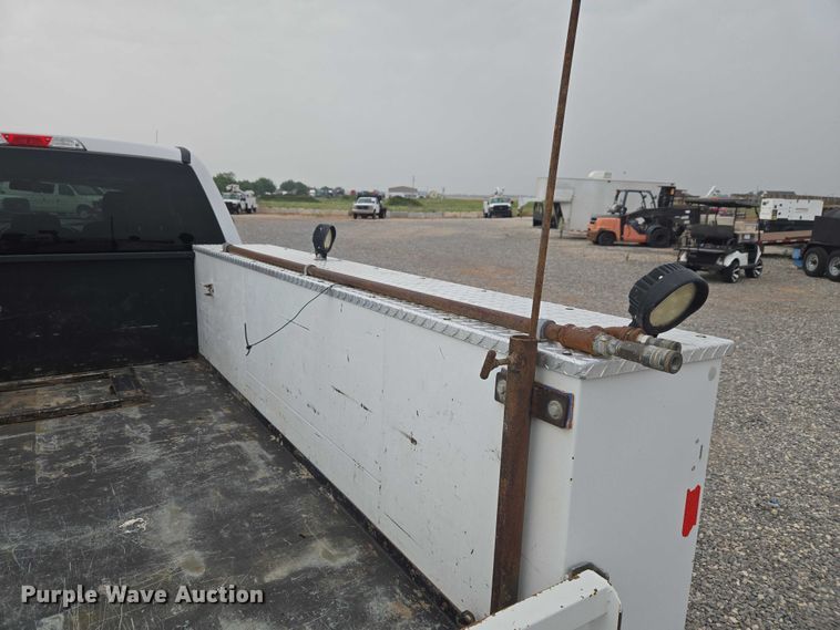 image for item EW0143 2019 Ford F250 Super Duty Ext. Cab utility bed pickup truck