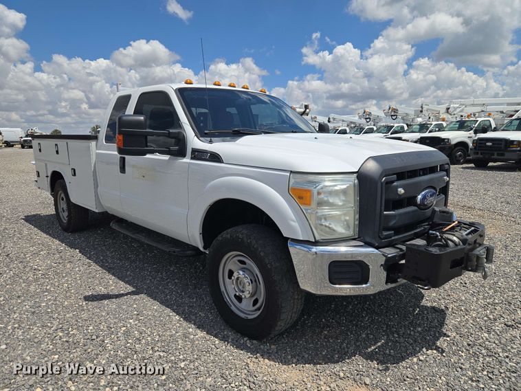 image for item EW0464 2016 Ford F350 Super Duty Ext. Cab utility bed pickup truck