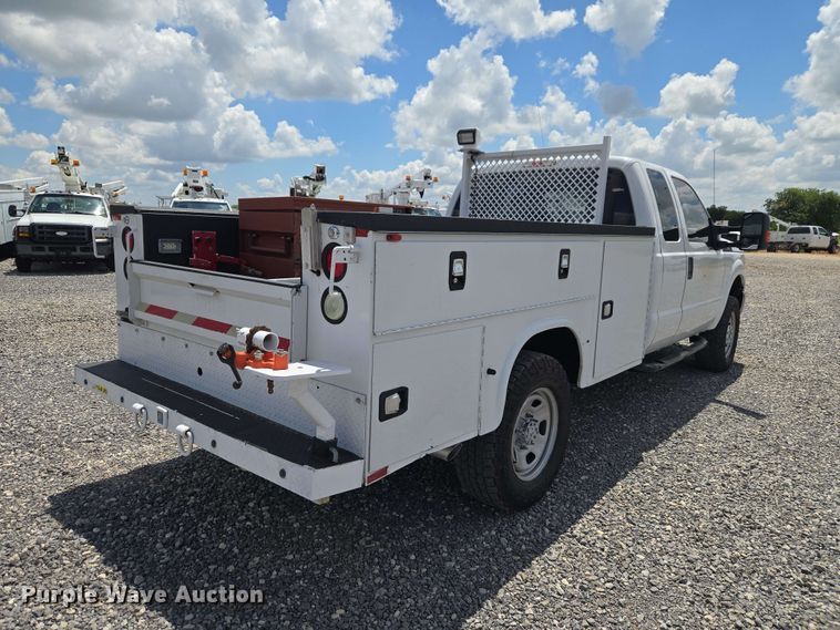 image for item EW0464 2016 Ford F350 Super Duty Ext. Cab utility bed pickup truck