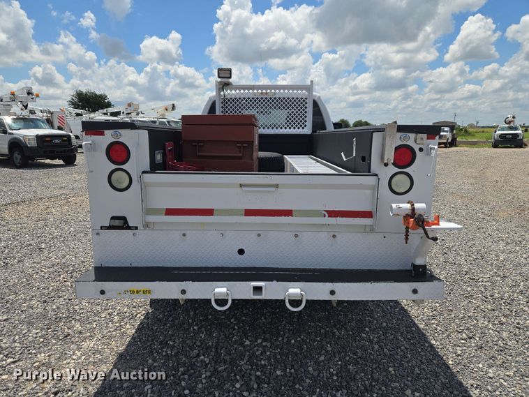 image for item EW0464 2016 Ford F350 Super Duty Ext. Cab utility bed pickup truck