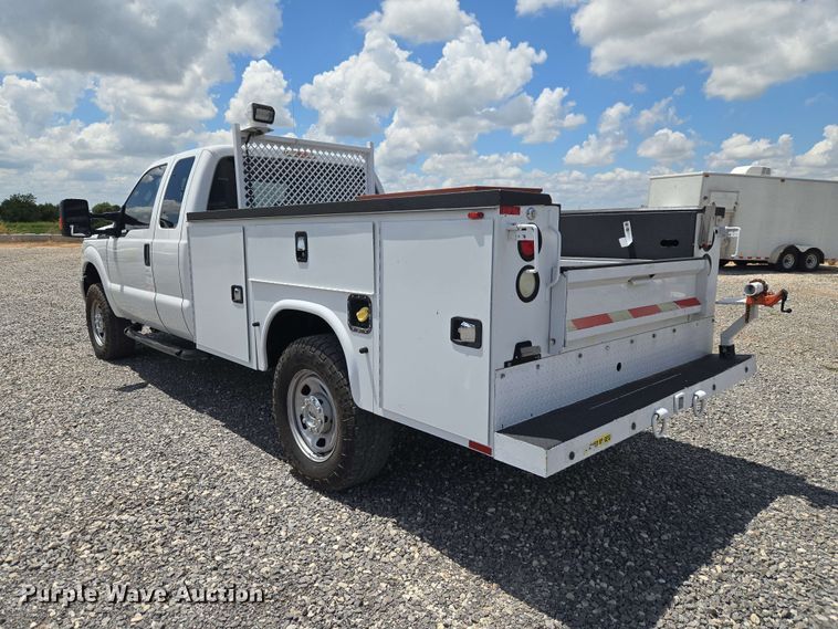 image for item EW0464 2016 Ford F350 Super Duty Ext. Cab utility bed pickup truck
