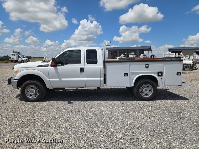 image for item EW0464 2016 Ford F350 Super Duty Ext. Cab utility bed pickup truck