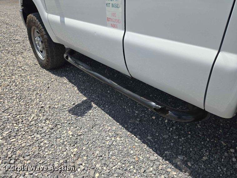 image for item EW0464 2016 Ford F350 Super Duty Ext. Cab utility bed pickup truck