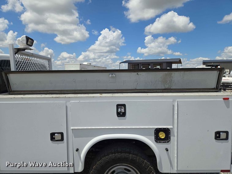 image for item EW0464 2016 Ford F350 Super Duty Ext. Cab utility bed pickup truck