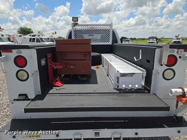 image for item EW0464 2016 Ford F350 Super Duty Ext. Cab utility bed pickup truck