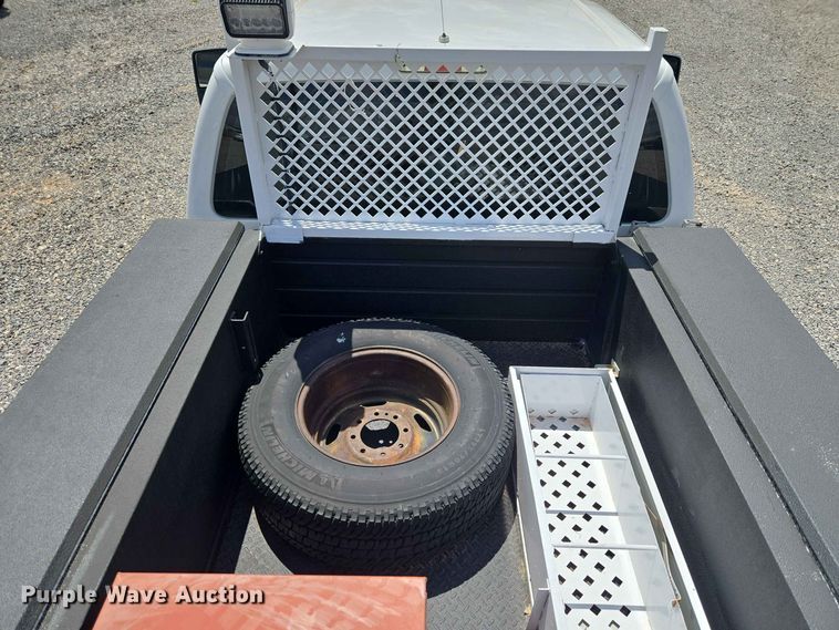 image for item EW0464 2016 Ford F350 Super Duty Ext. Cab utility bed pickup truck