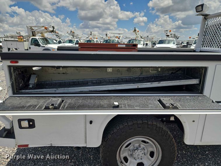 image for item EW0464 2016 Ford F350 Super Duty Ext. Cab utility bed pickup truck