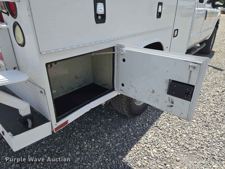 image for item EW0464 2016 Ford F350 Super Duty Ext. Cab utility bed pickup truck