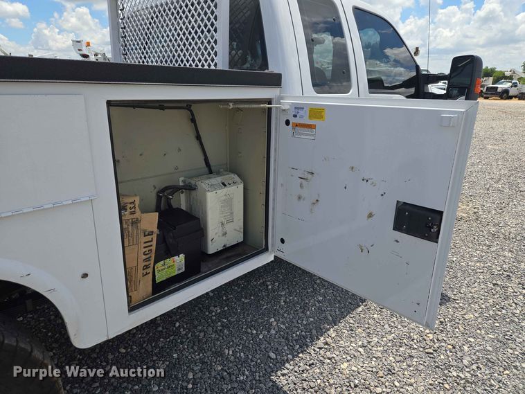 image for item EW0464 2016 Ford F350 Super Duty Ext. Cab utility bed pickup truck