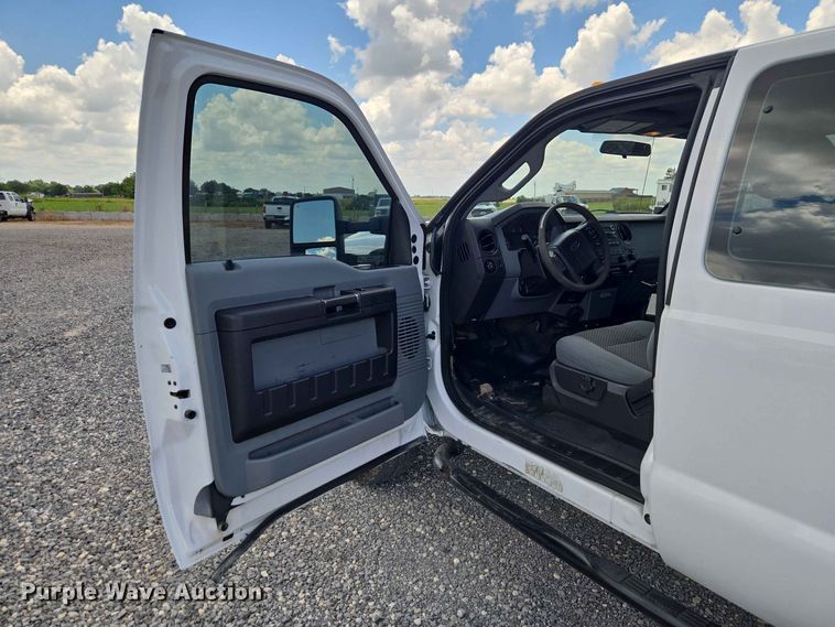 image for item EW0464 2016 Ford F350 Super Duty Ext. Cab utility bed pickup truck