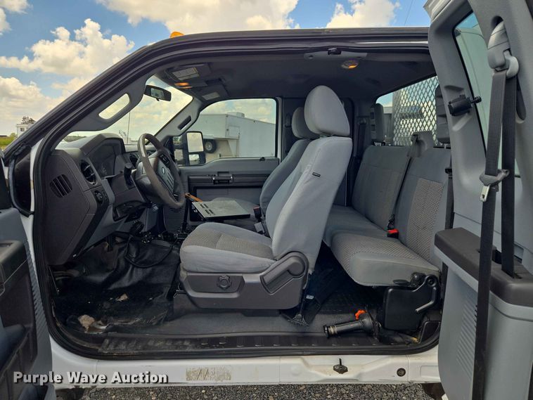 image for item EW0464 2016 Ford F350 Super Duty Ext. Cab utility bed pickup truck