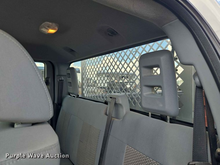 image for item EW0464 2016 Ford F350 Super Duty Ext. Cab utility bed pickup truck