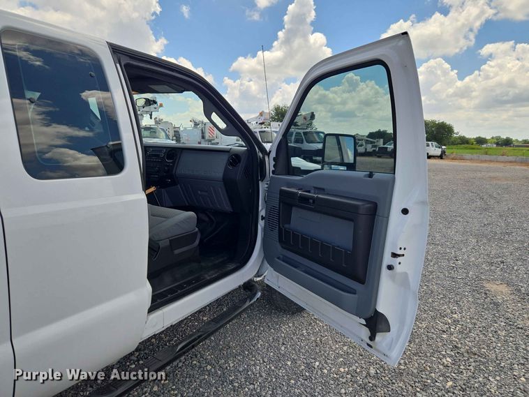 image for item EW0464 2016 Ford F350 Super Duty Ext. Cab utility bed pickup truck