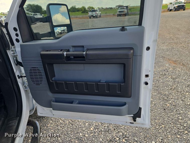 image for item EW0464 2016 Ford F350 Super Duty Ext. Cab utility bed pickup truck