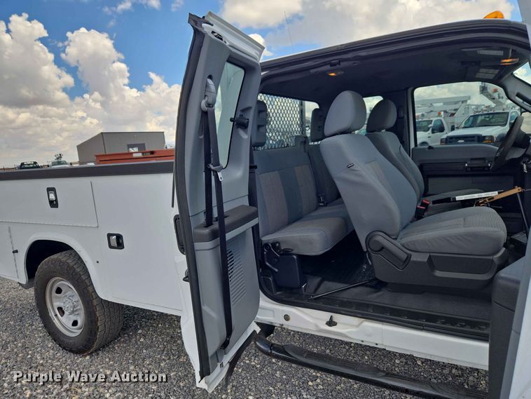image for item EW0464 2016 Ford F350 Super Duty Ext. Cab utility bed pickup truck