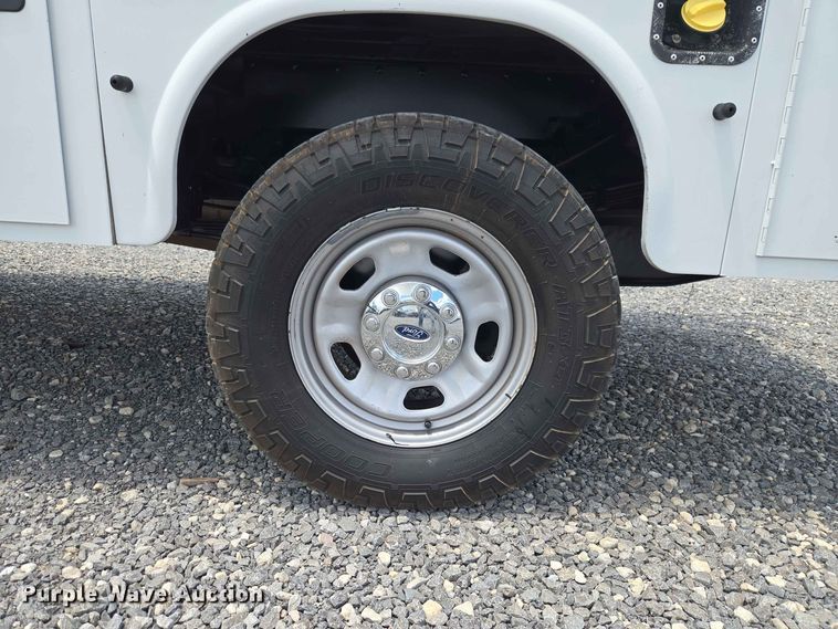image for item EW0464 2016 Ford F350 Super Duty Ext. Cab utility bed pickup truck