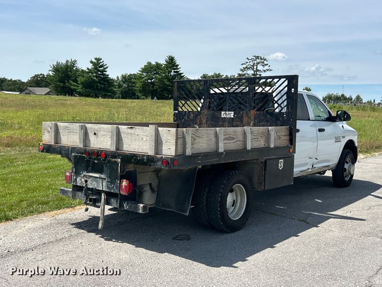 image for item FC2801 2015 RAM 3500 Heavy Duty Crew Cab flatbed pickup truck