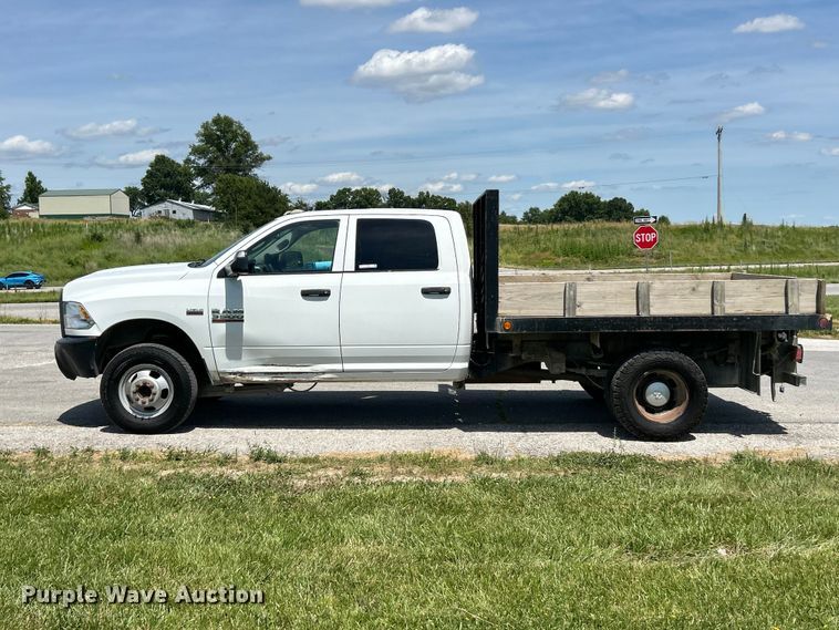 image for item FC2801 2015 RAM 3500 Heavy Duty Crew Cab flatbed pickup truck