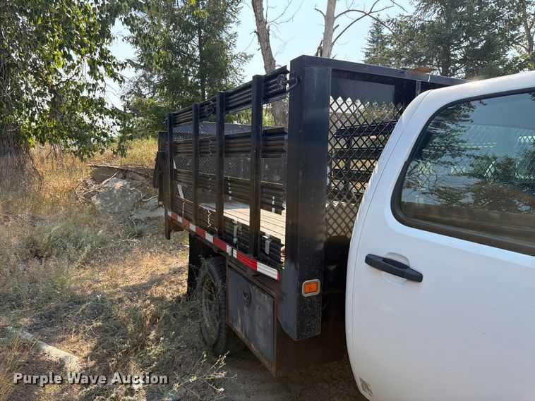 image for item FK4558 2011 Chevrolet Silverado 3500HD Crew Cab flatbed pickup truck